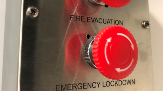 Two red buttons, with the words 'fire evacuation' on one and 'emergency lockdown' on the other.