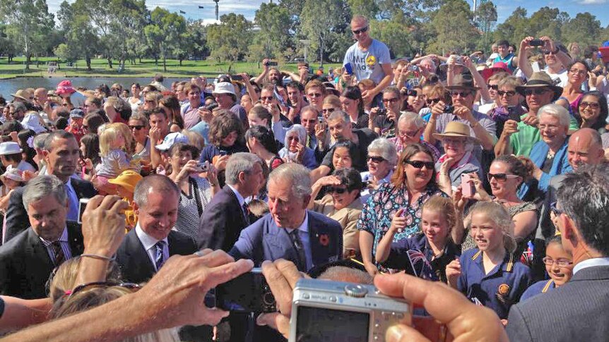 Prince Charles meets the crowds on the banks of the River Torrens