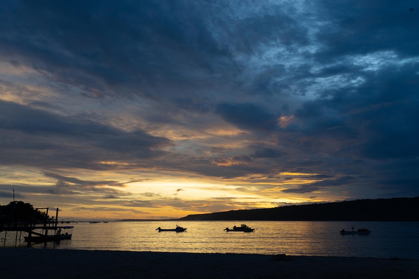 A photo of a beautiful sunset over the water in Vanuatu.