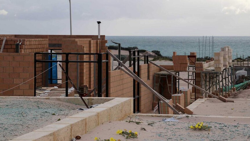 A house being constructed in Perth, with the ocean in the background.