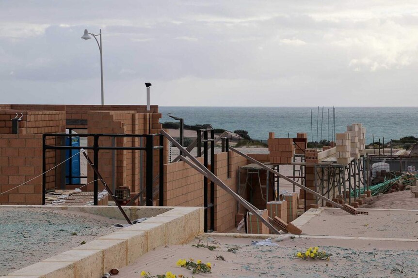 A house being constructed in Perth, with the ocean in the background.