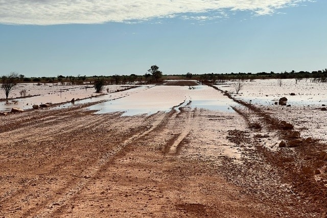 Flooding on an outback dirt road. 