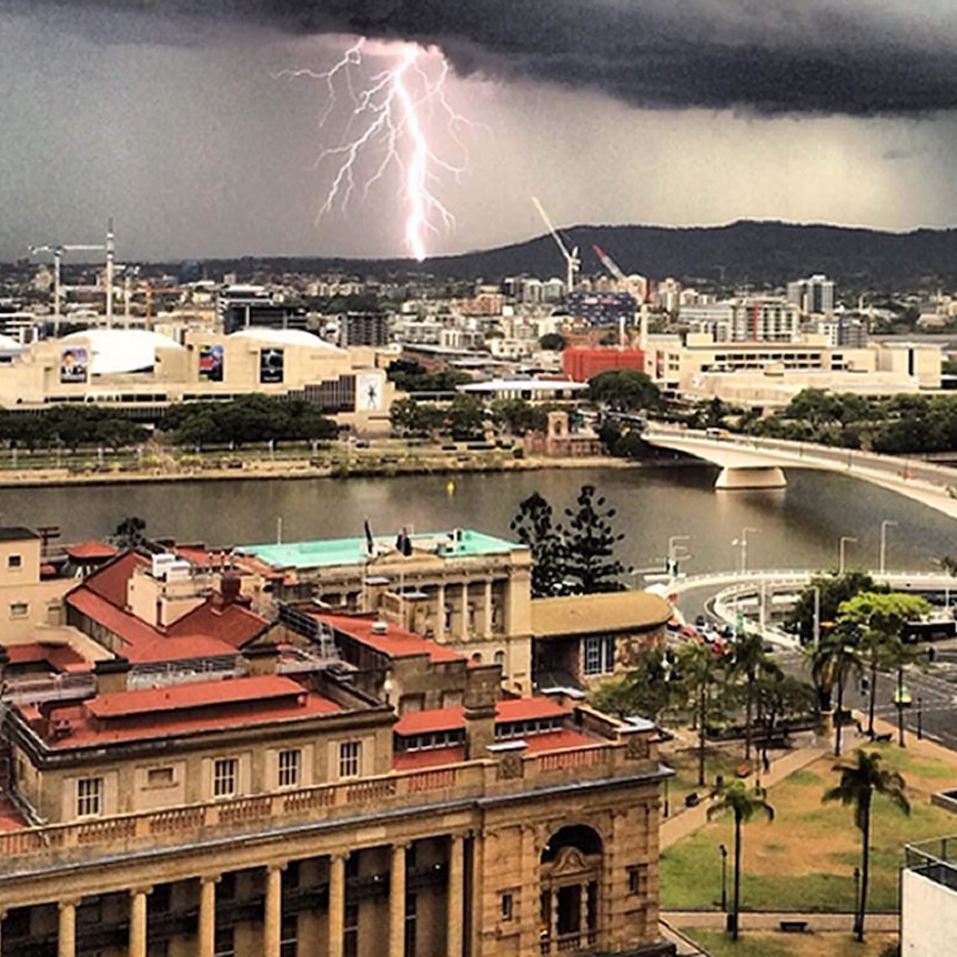 Lightning strikes over Brisbane's west as the thunderstorm approached.