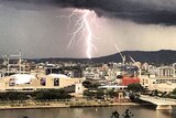 Lightning strikes over Brisbane's west as the thunderstorm approached.