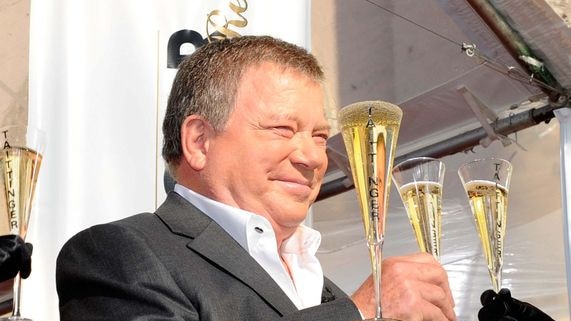 Actor William Shatner enjoys a champagne on the red carpet