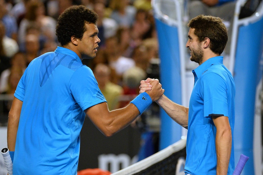 Tsonga wins French battle against Simon