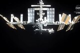 A grainy photo of the International Space Station