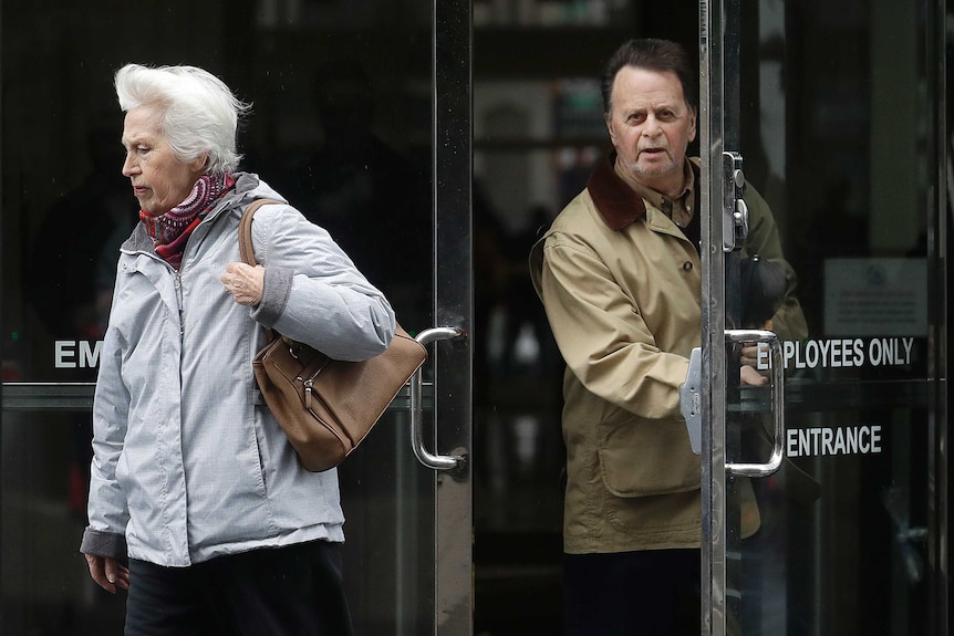 Edwin Hardeman leaves a courthouse with his wife Mary