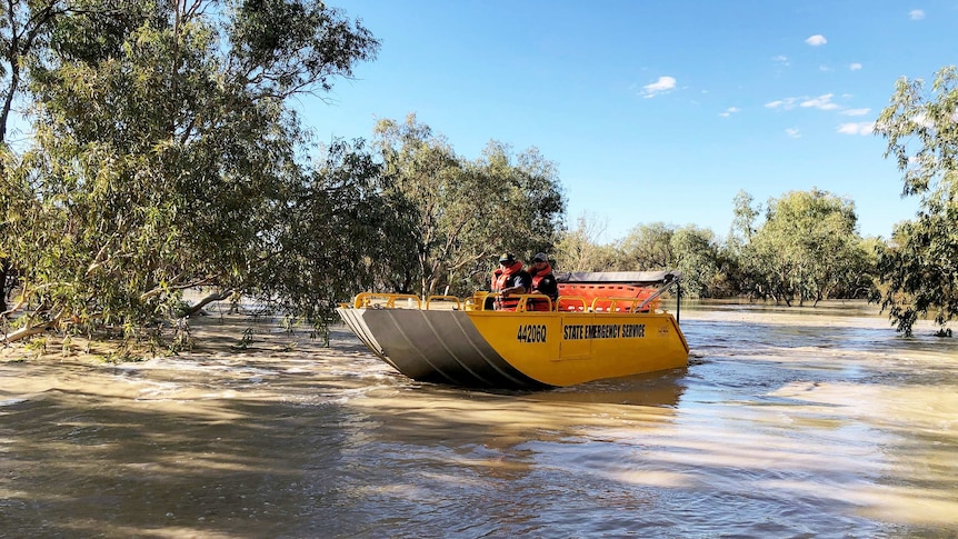 A bright yellow SES boat on the Bulloo River