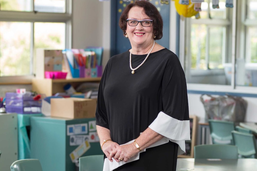 Full-length portrait of Queensland Association of State School Principals president Leslie Single