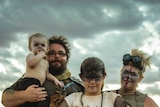 Mad Max fans Michael and Nikola Hughes, with their children Willow Hughes and Deyonne Reiss in costume.
