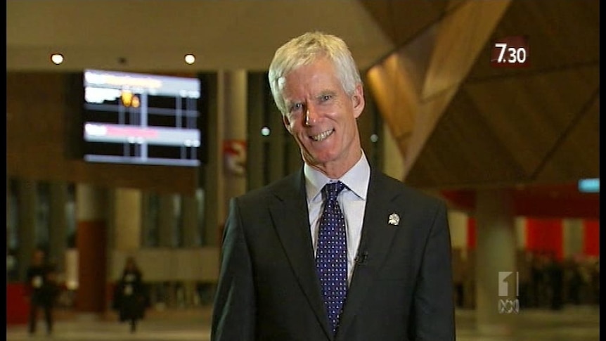 Australia's CERN delegate Geoff Taylor talks to 7.30