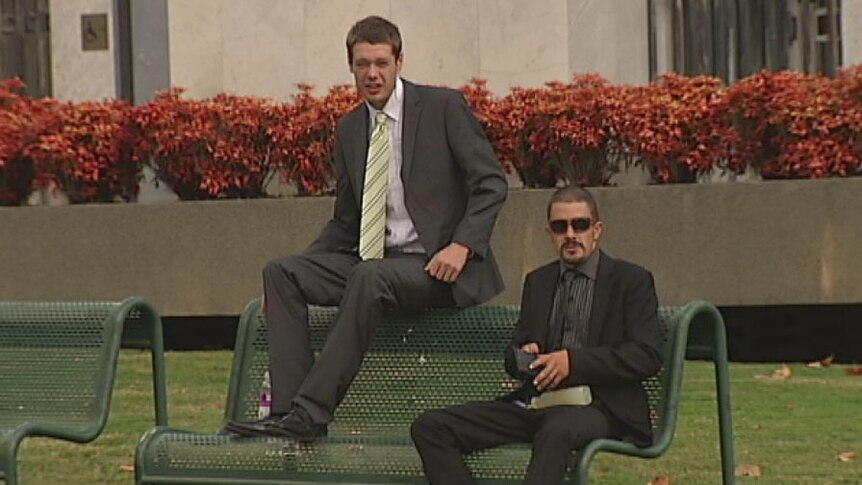 Cameron Ashcroft and Todd Elphick outside court in April.