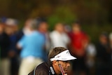 Sizzling start ... Apleby lines up a putt in his first round.