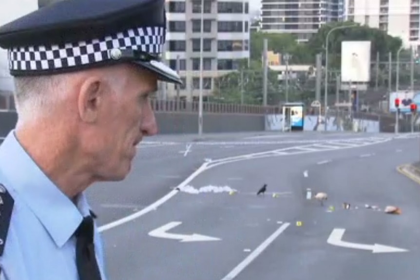 Inspector Daniel Bragg at the scene of the fatal stabbing of a German backpacker on Milton Road in Brisbane's CBD.