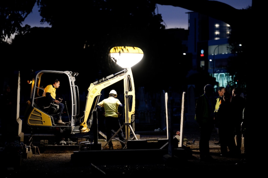 A small excavator in Adelaide's West Terrace cemetery.