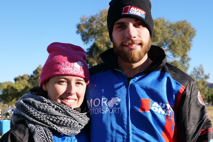 Amy is on the left wearing a pink beanie, and Jack Mildwaters in on right wearing black beanie.