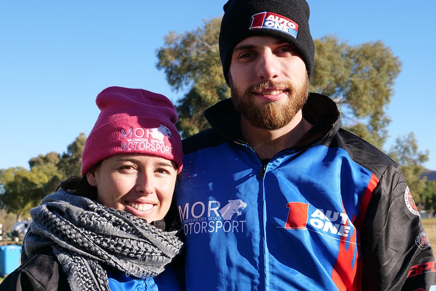 Amy is on the left wearing a pink beanie, and Jack Mildwaters in on right wearing black beanie.