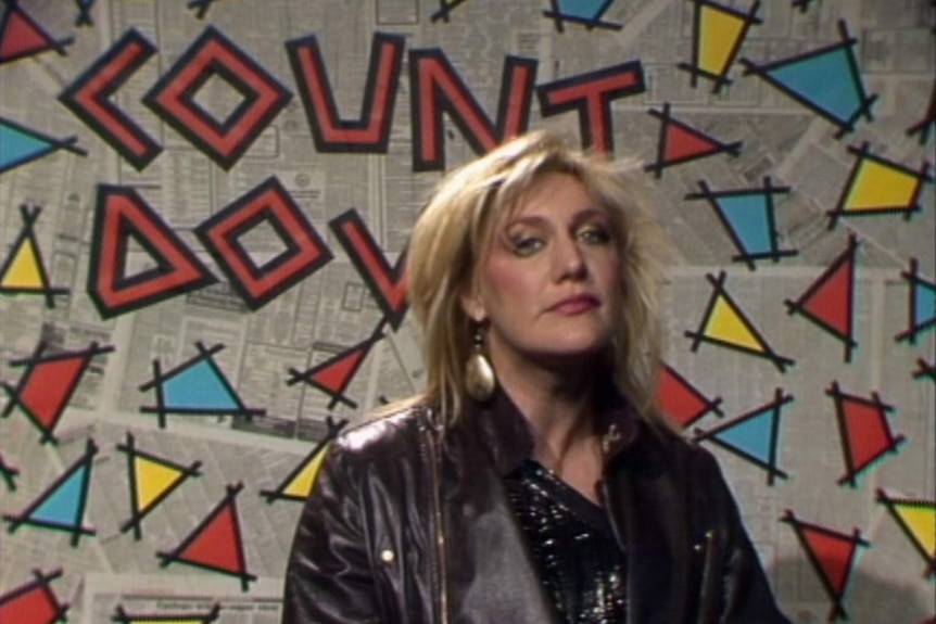 Singer Renee Geyer against a backdrop for TV show Countdown