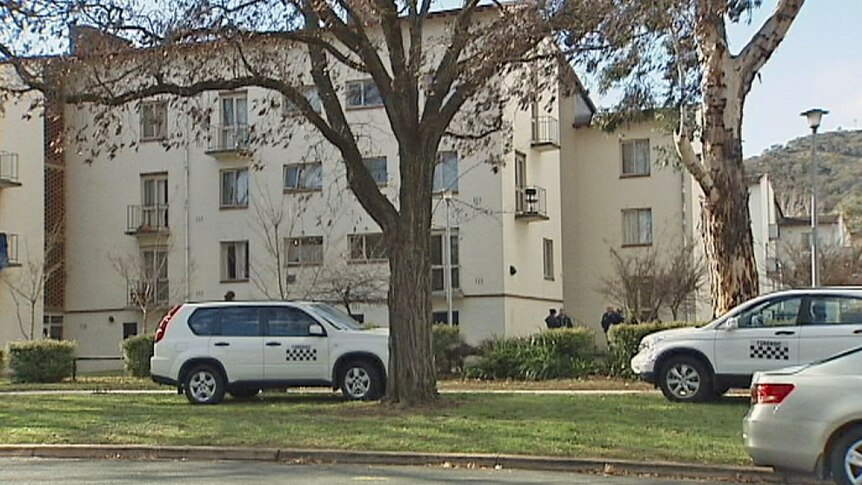 Police were called to a Reid flat after receiving a call from a friend of the victim.
