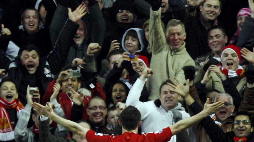 Robbie Keane celebrates his second goal against Bolton