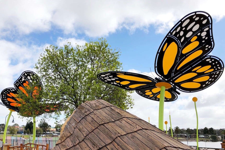 The playground's main theme is Mulga Bill's Bicycle, but the butterflies dominate the skyline.