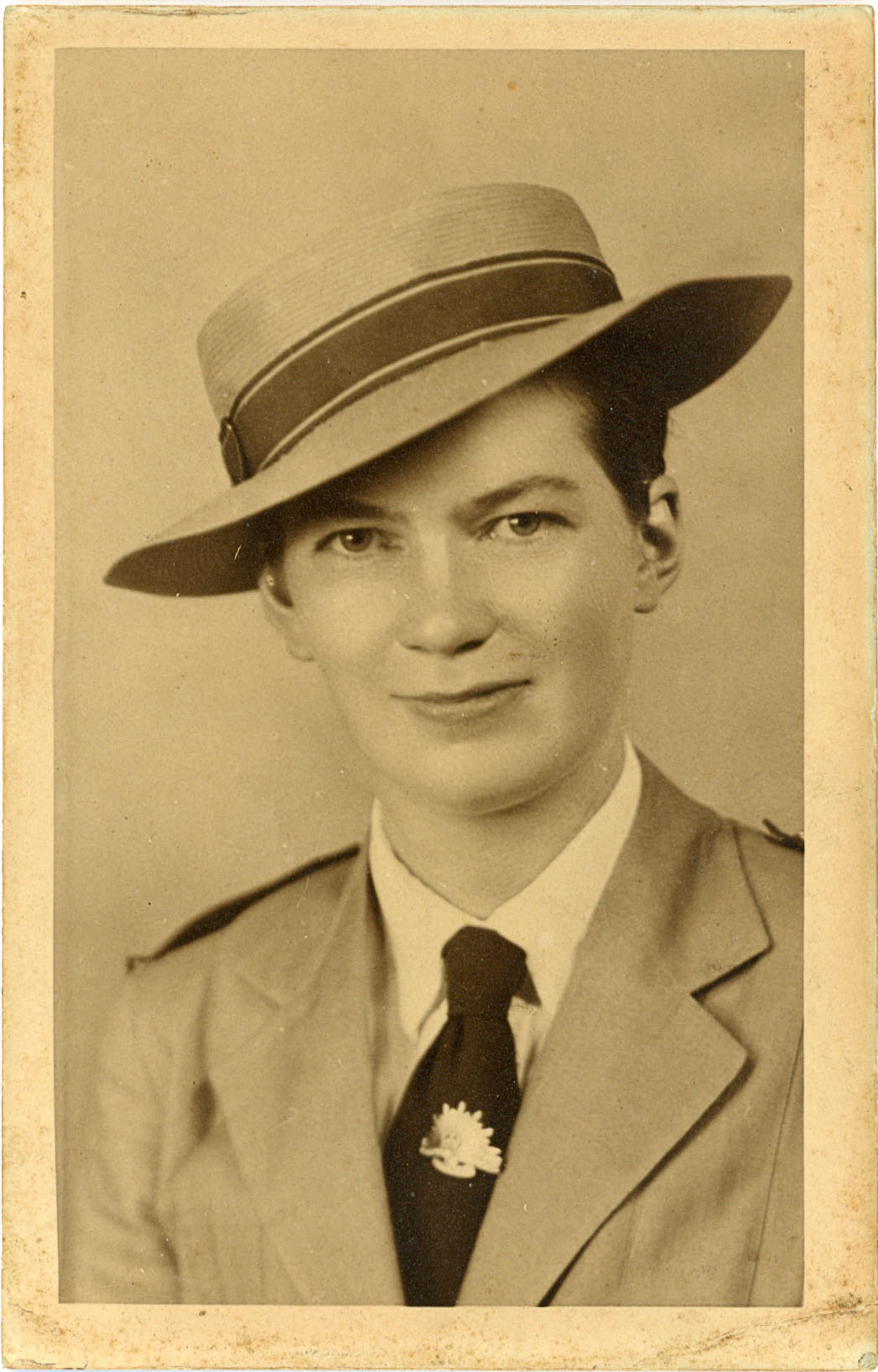 Historic headshot of woman in military hat