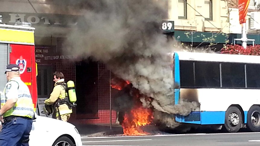 Bus catches on fire in Darlinghurst.