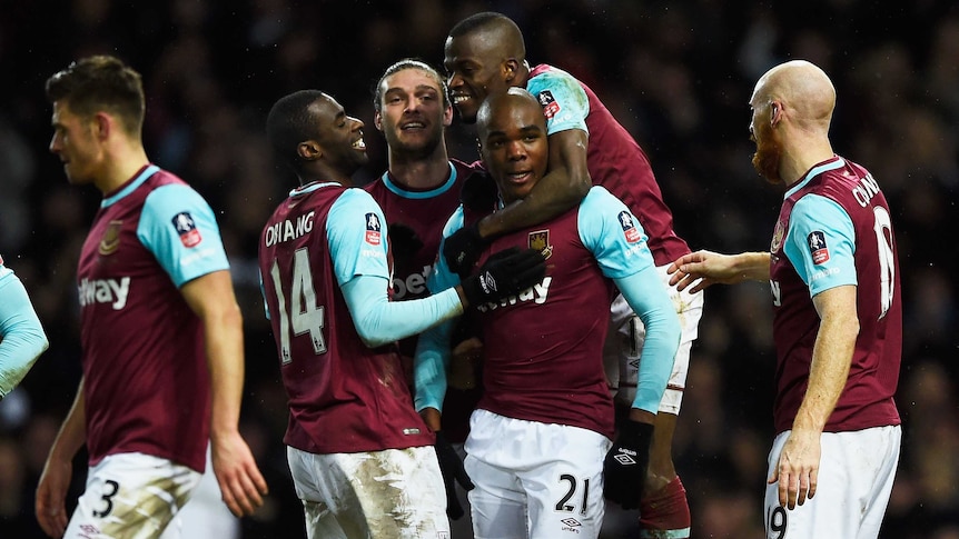 Angelo Ogbonna celebrates with West Ham United team-mates