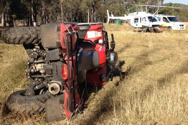 Quad bike overturned on a farm.