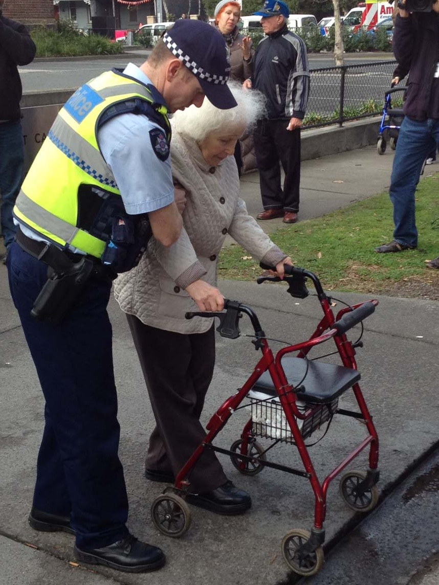 Police officer helps elderly resident after Melbourne gas leak