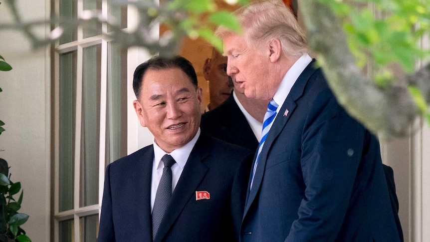 Donald Trump talks with Kim Yong-chol.