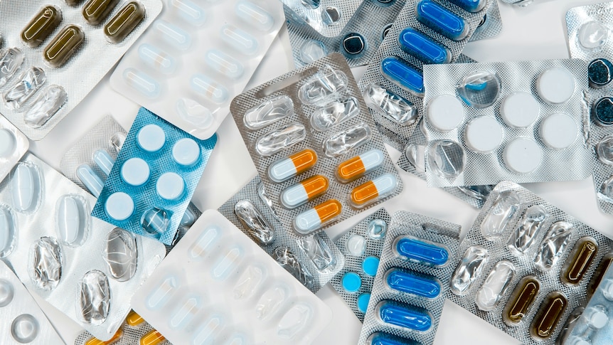 Coloured pills in blister packs