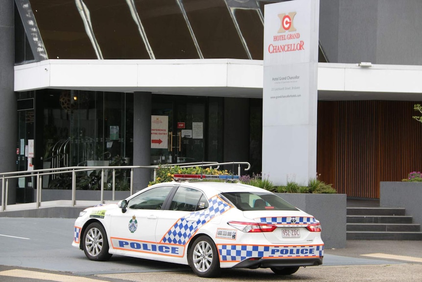 Police car in front driveway of Hotel Grant Chancellor at Spring Hill in inner-city Brisbane