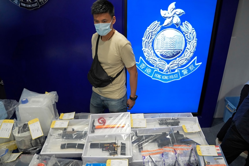 Confiscated evidence is displayed during a news conference.