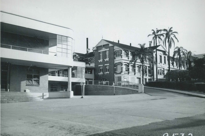 Black and white image of hospital building.
