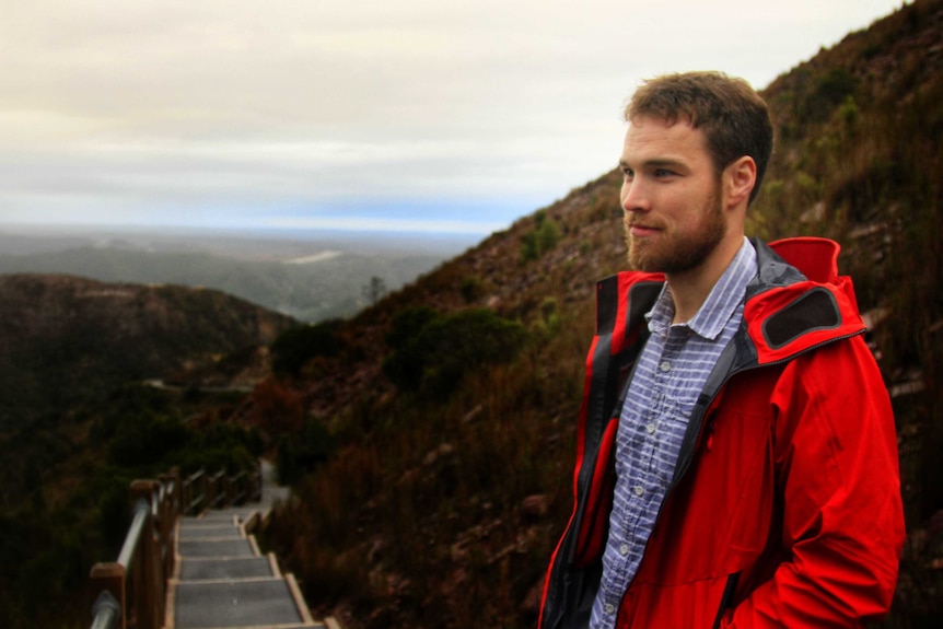 Doctor Rob Dixon stands on a walking track near Queenstown