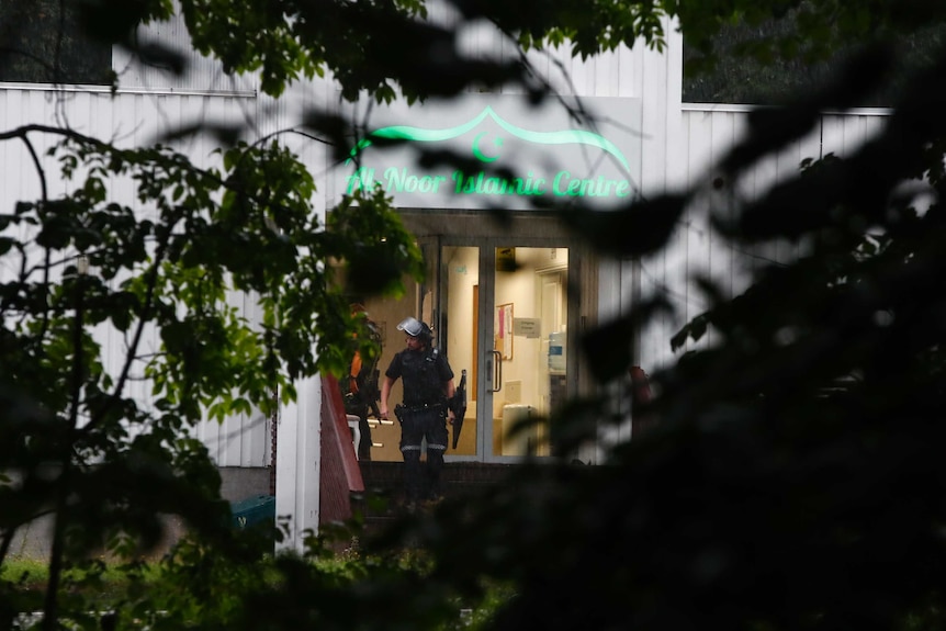 Police attend the scene after a shooting inside the al-Noor Islamic centre mosque.