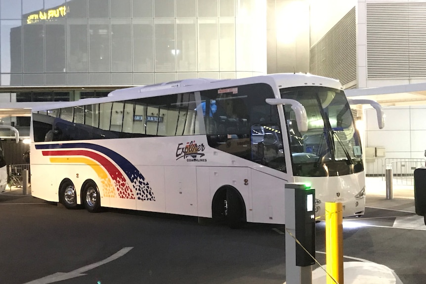 a bus parked outside Adelaide Airport