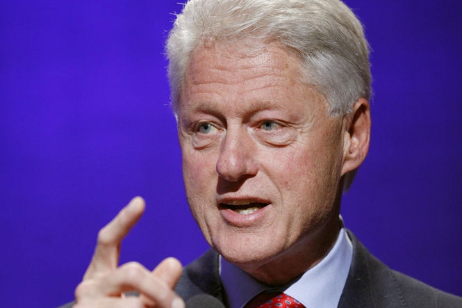 Good generic of Bill Clinton speaking at podium, finger raised