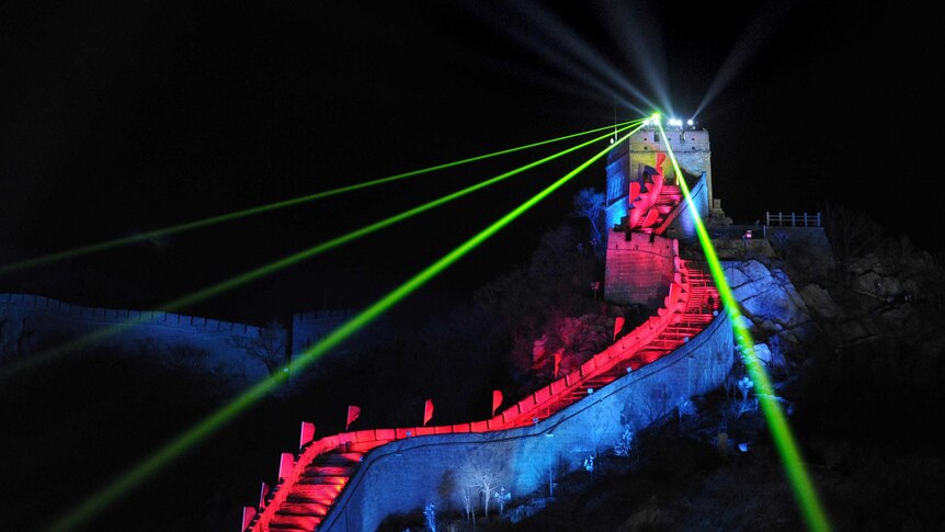 A lightshow illuminates the Great Wall outside Beijing, China, during the New Year's Eve countdown.