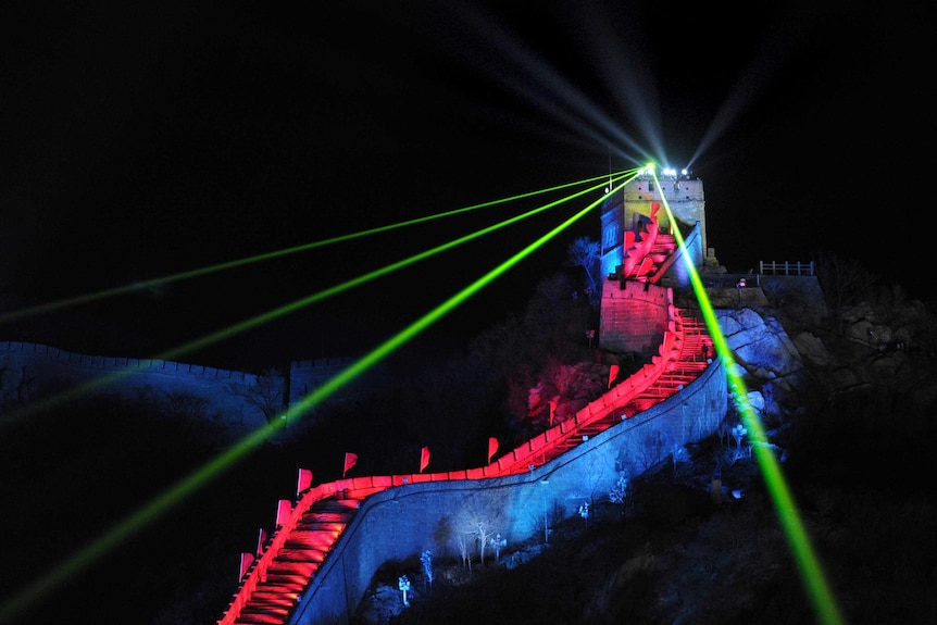A lightshow illuminates the Great Wall outside Beijing, China, during the New Year's Eve countdown.