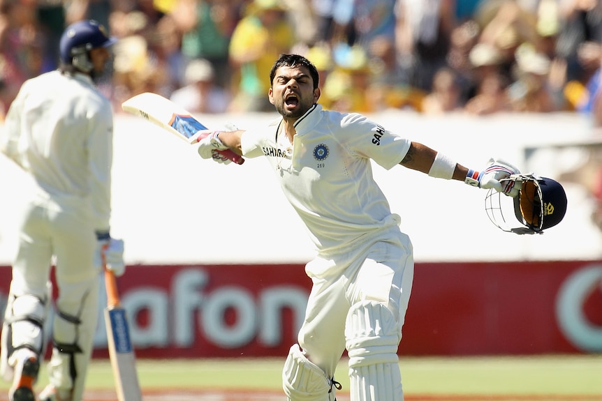 Virat Kohli celebrates his century