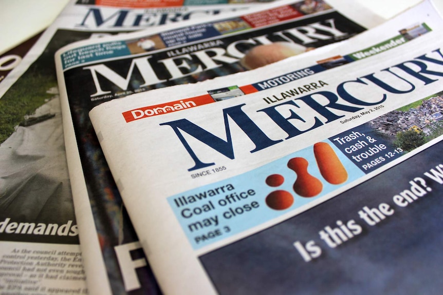 Fanned-out copies of the Illawarra Mercury newspaper.
