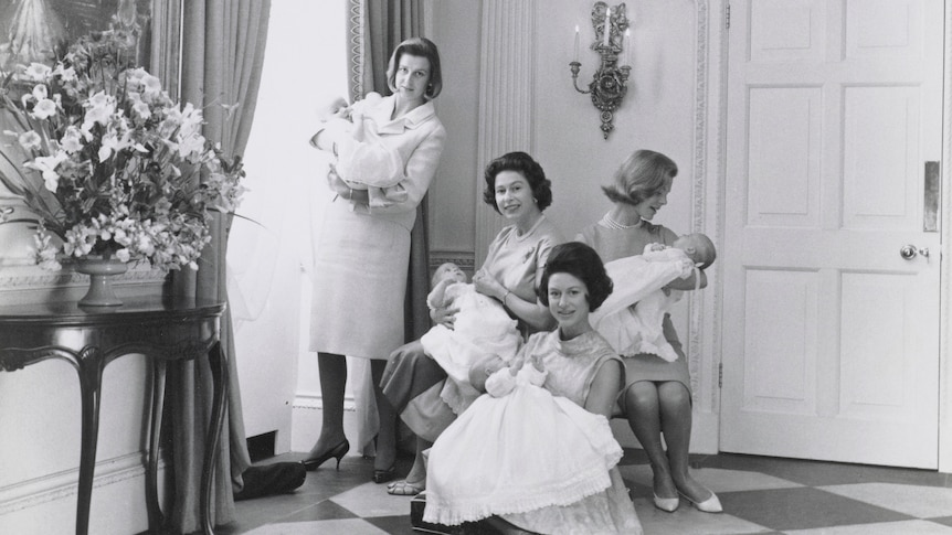 Queen Elizabeth II, Princess Margaret, Princess Alexandra and The Duchess of Kent hold their babies in 1964