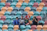 Small turn out ... Spectators celebrate a four during day one of the first Test between Australia and West Indies