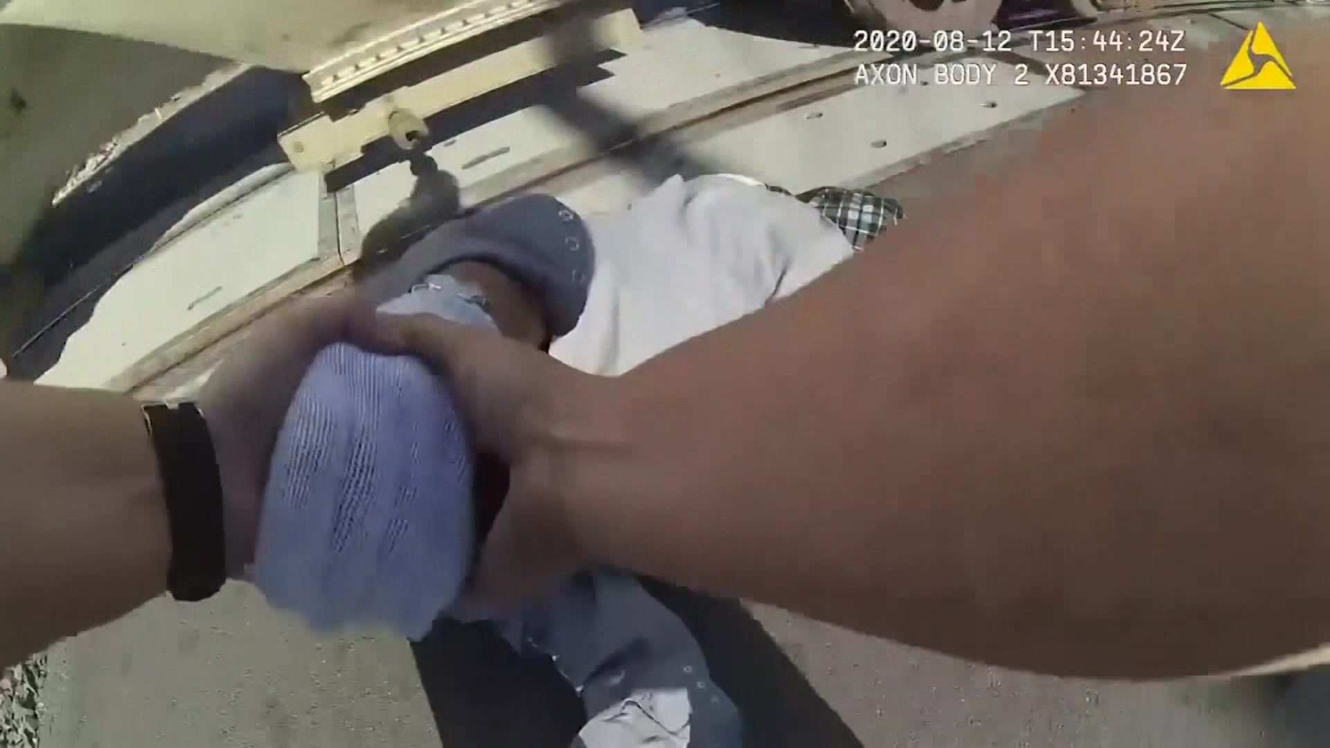 US police officer rescues man whose wheelchair became stuck on train ...