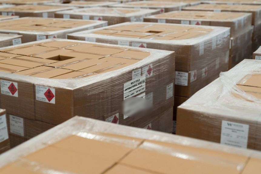 Rows of boxes of stockpiled PPE.