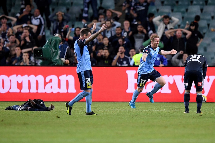 Sydney FC celebrate a last-gasp goal