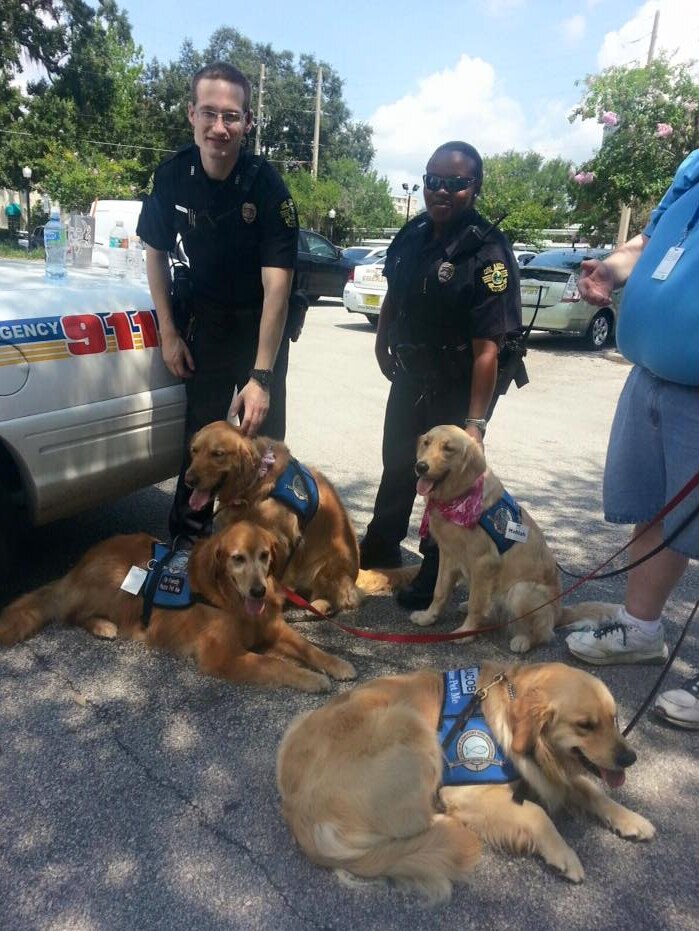 Comfort dogs with police officers